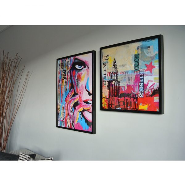 woonkamer kunstposters martinitoren en YOU in lijst janet edens schilderijen